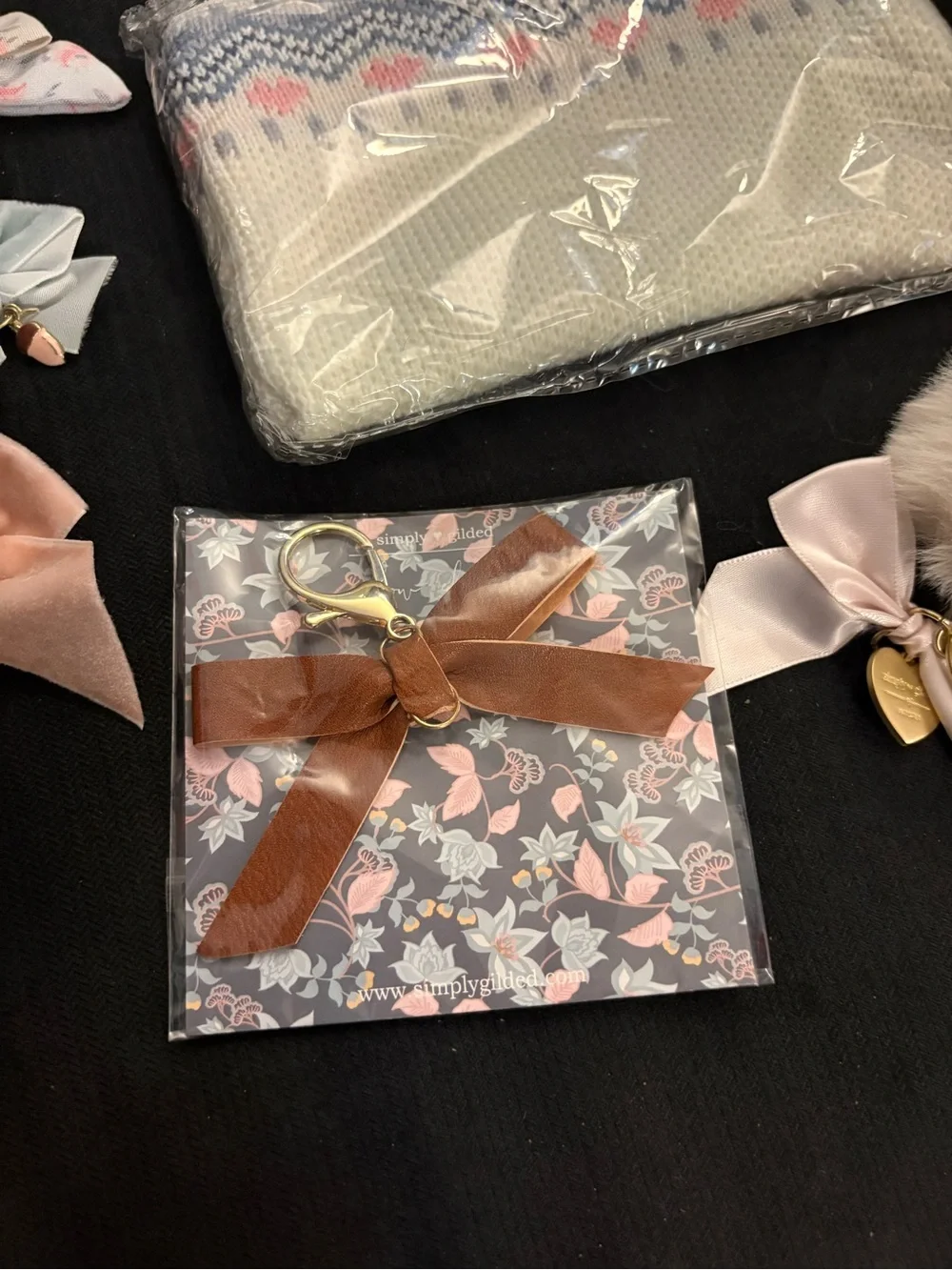 Simply Gilded pouch and 5 bows Pom Pom clips keychain